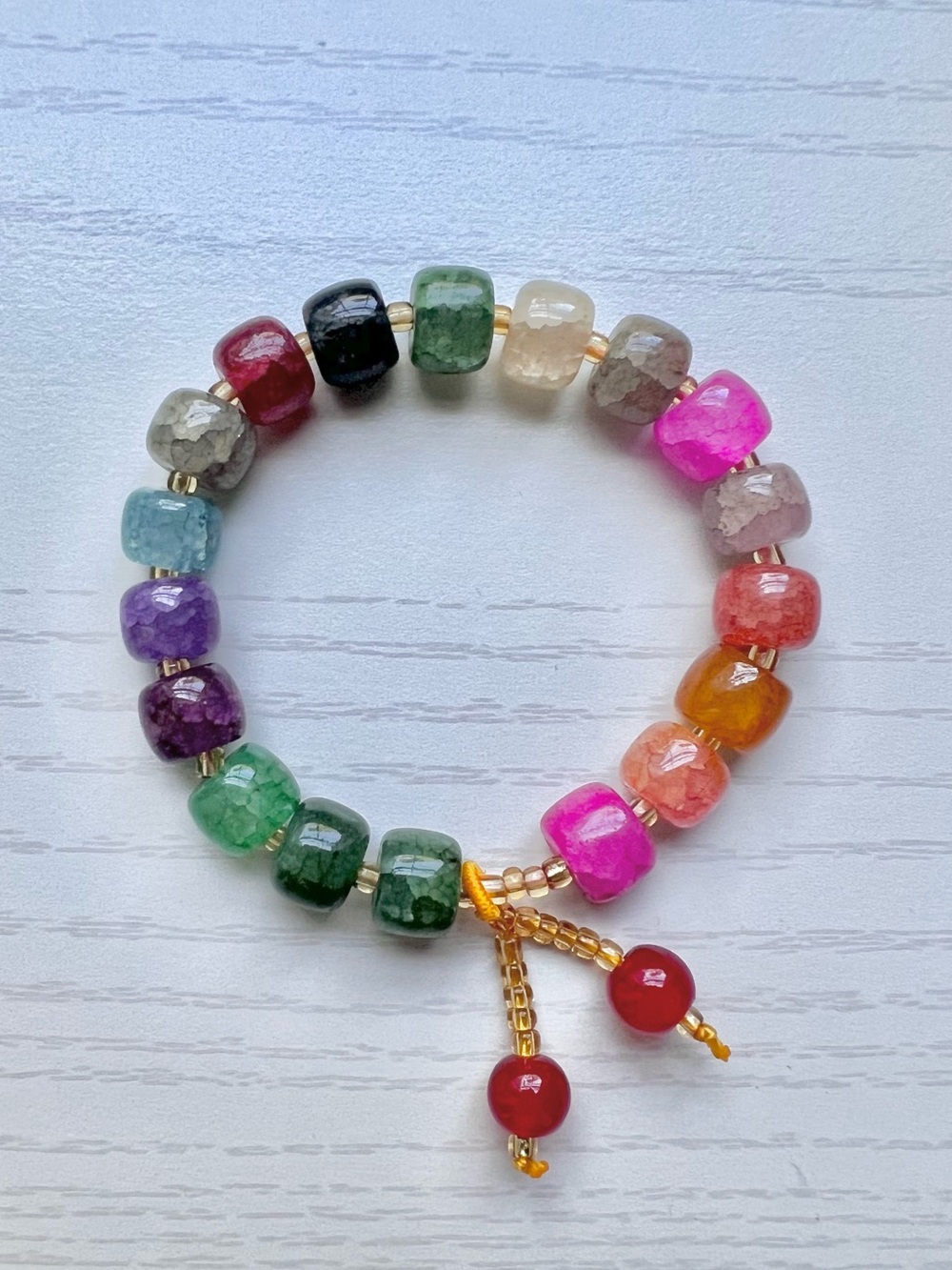 Multicolor Faceted Glass Bead Stretch Bracelet w/ Cherry charm accent